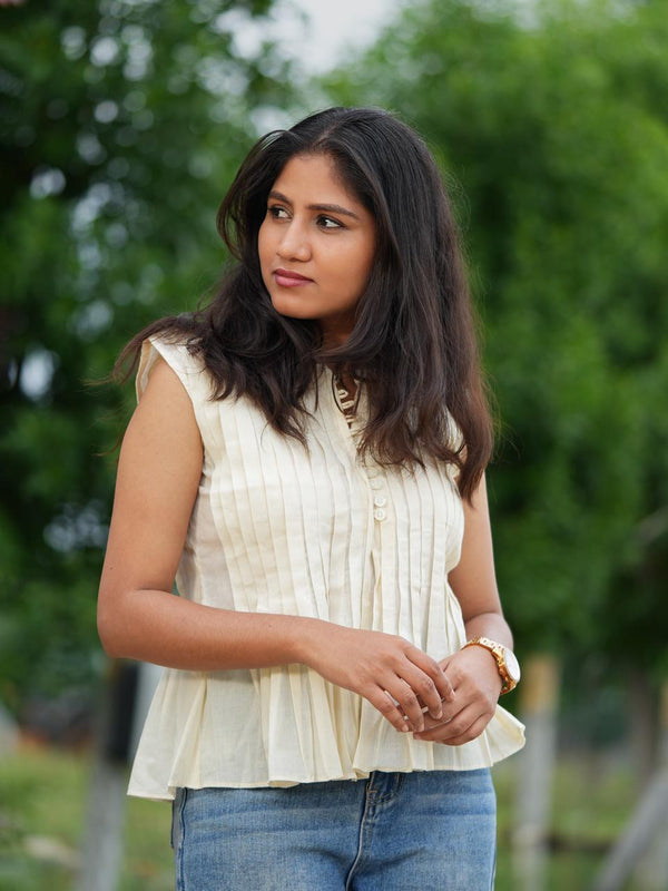 The Pleated Peplum Blouse