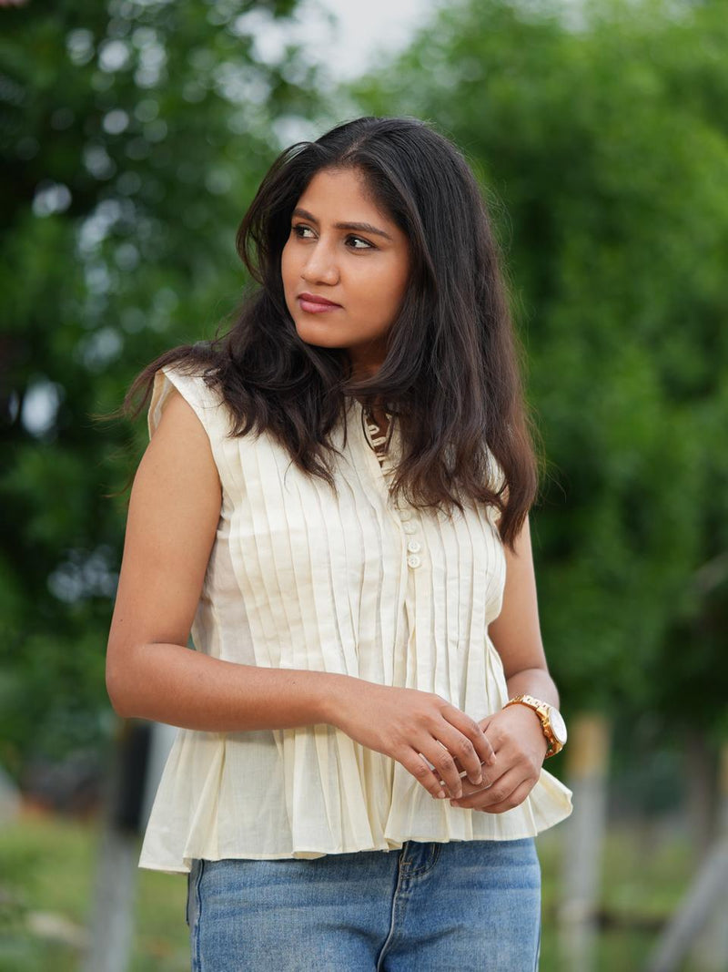 The Pleated Peplum Blouse